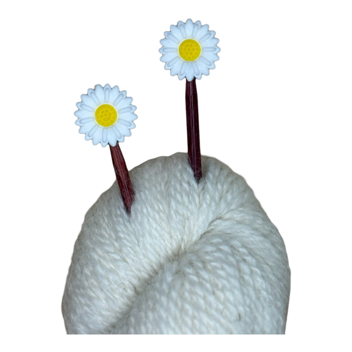 Daisy Needle Stoppers